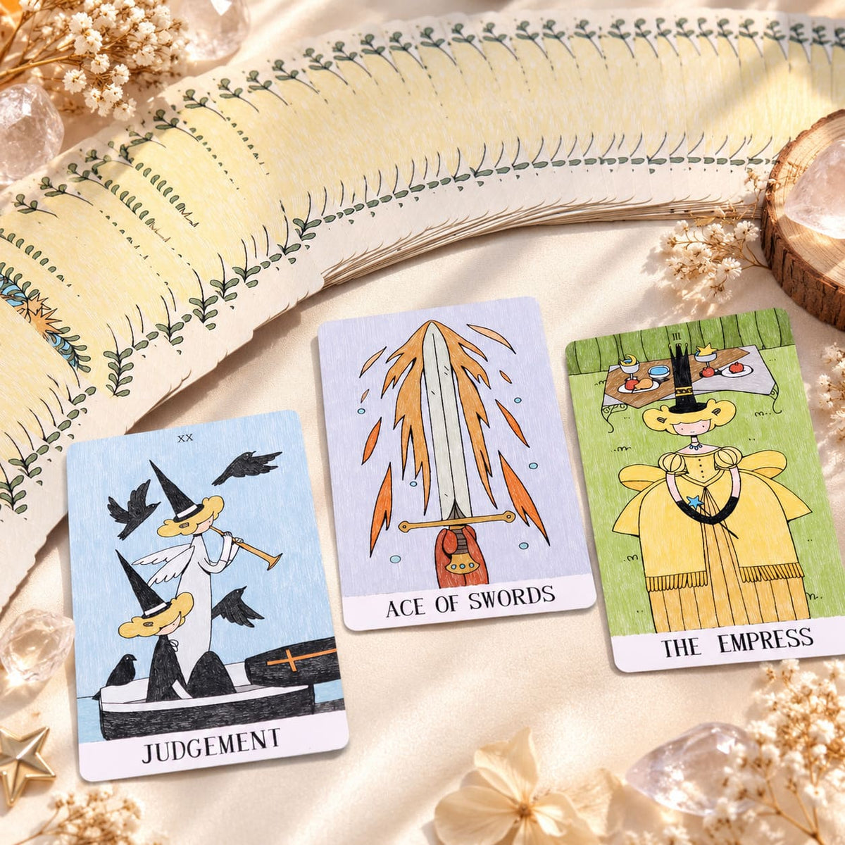 Mystery Valley Tarot DELUXE tarot card artwork with playful witches, storybook forests, and oversized fantasy creatures