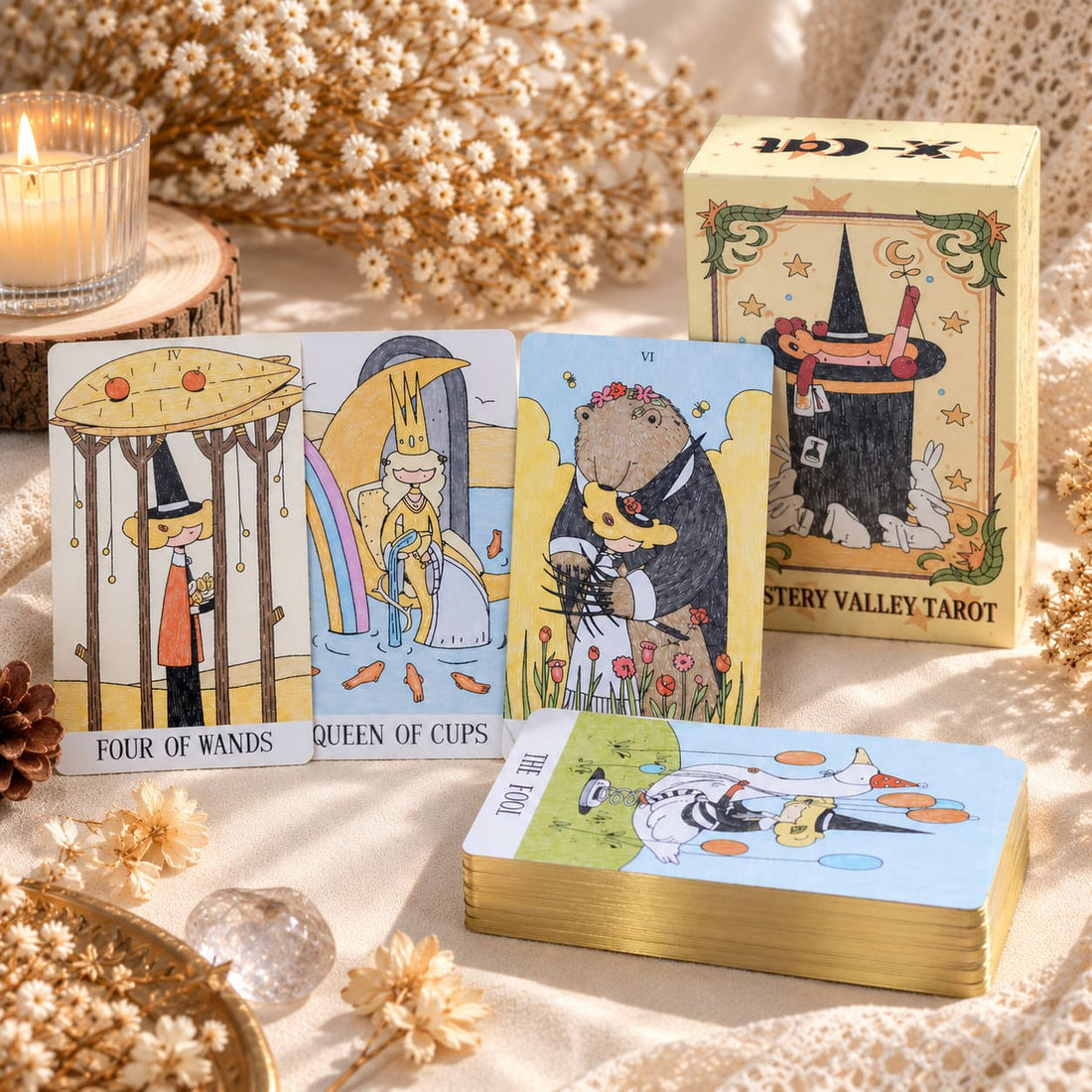 Mystery Valley Tarot DELUXE tarot card artwork with playful witches, storybook forests, and oversized fantasy creatures