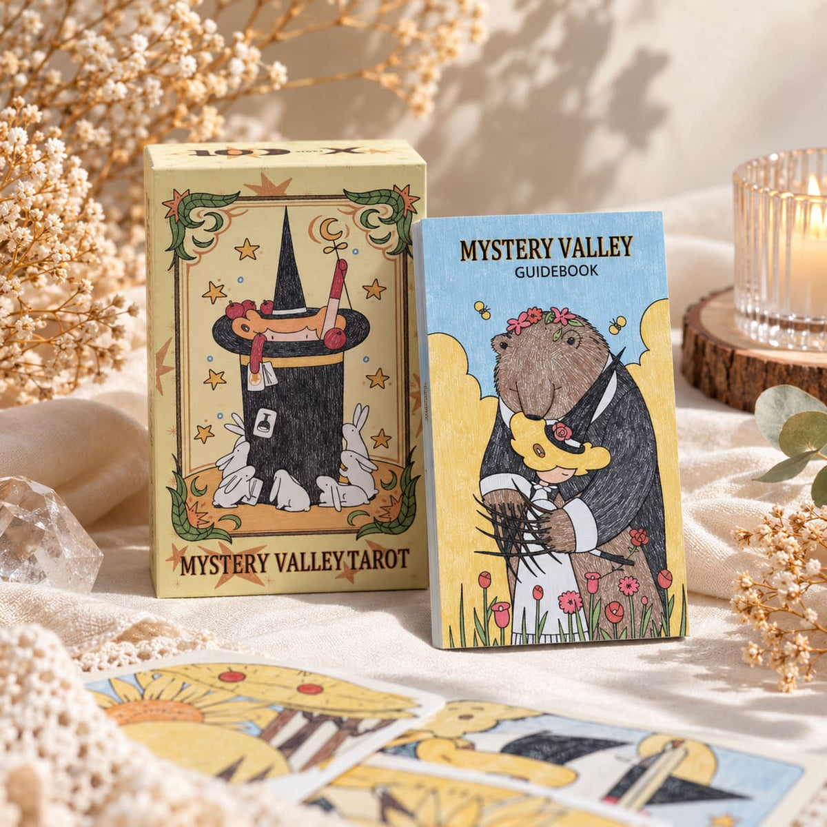 Mystery Valley Tarot DELUXE tarot card artwork with playful witches, storybook forests, and oversized fantasy creatures