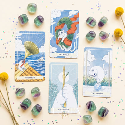 Nimn White Cat Tarot cute cartoon indie tarot deck with holographic silver edges for inner child healing.