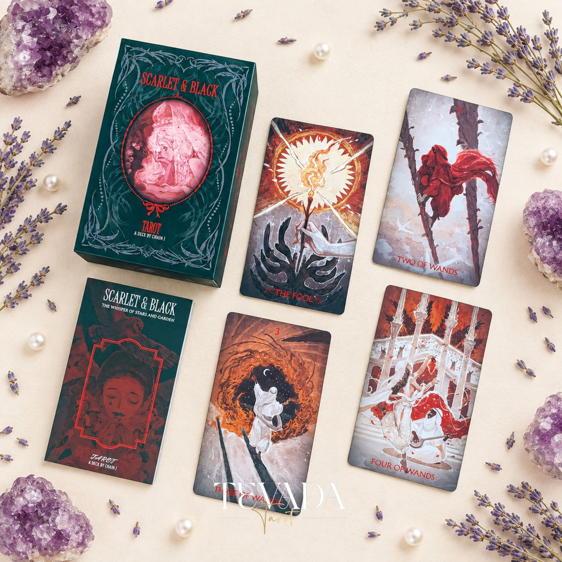 The Scarlet &amp; Black Tarot box shown open with its red interior and matching illustrated deck packaging.
