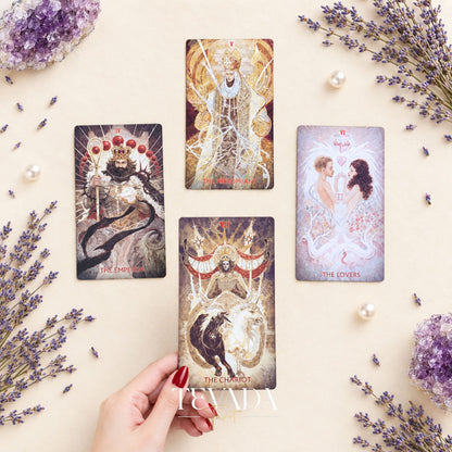 A fan of dark Scarlet &amp; Black Tarot card backs with red wing motifs and a pale illustrated card below.