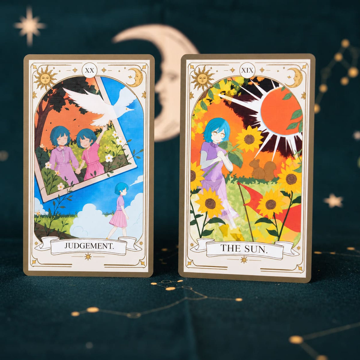The Hedge Maze Tarot Judgement and The Sun cards with colorful storybook illustrations on dark green velvet.