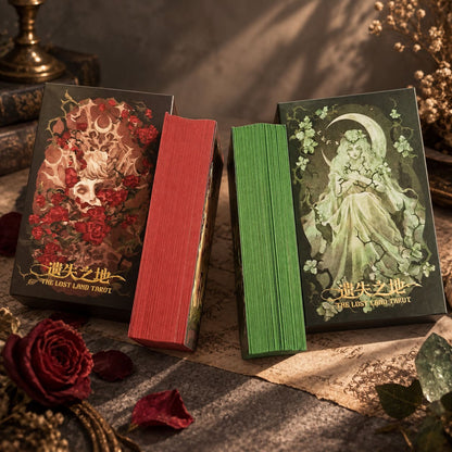 The Lost Land Tarot dark watercolor fantasy cards in Rebirth and Fading editions for shadow work