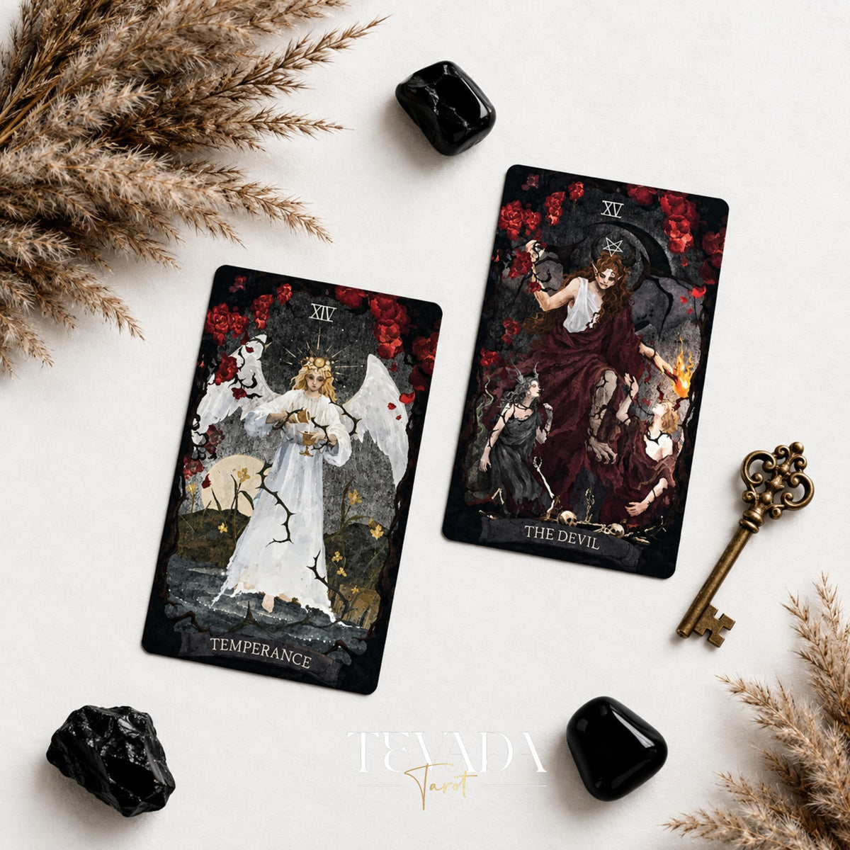 The Lost Land Tarot Fading Edition Temperance and The Devil cards displayed with a black crystal and vintage key