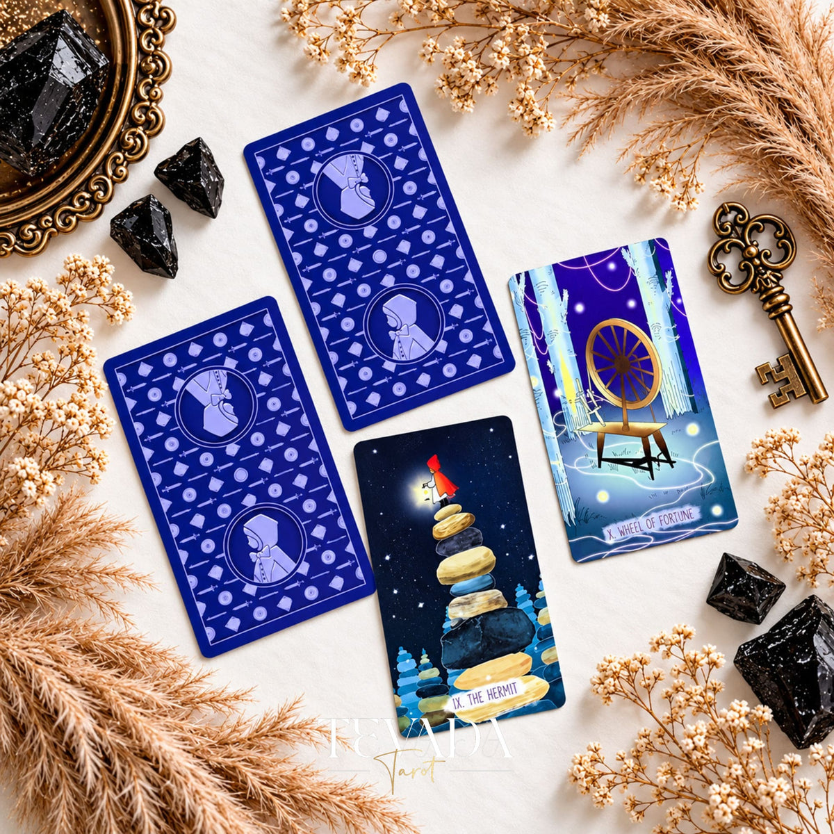 The Hermit and Wheel of Fortune cards with blue card backs from The Verdant Hollow Tarot